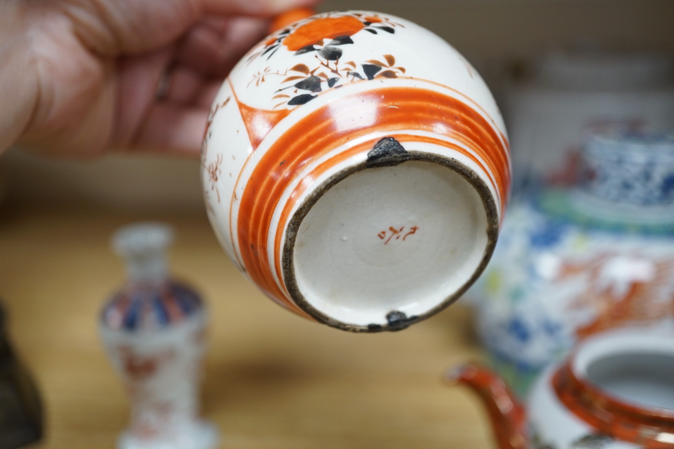 Two pieces of Japanese Kutani, a small Imari vase and three Chinese tea pots